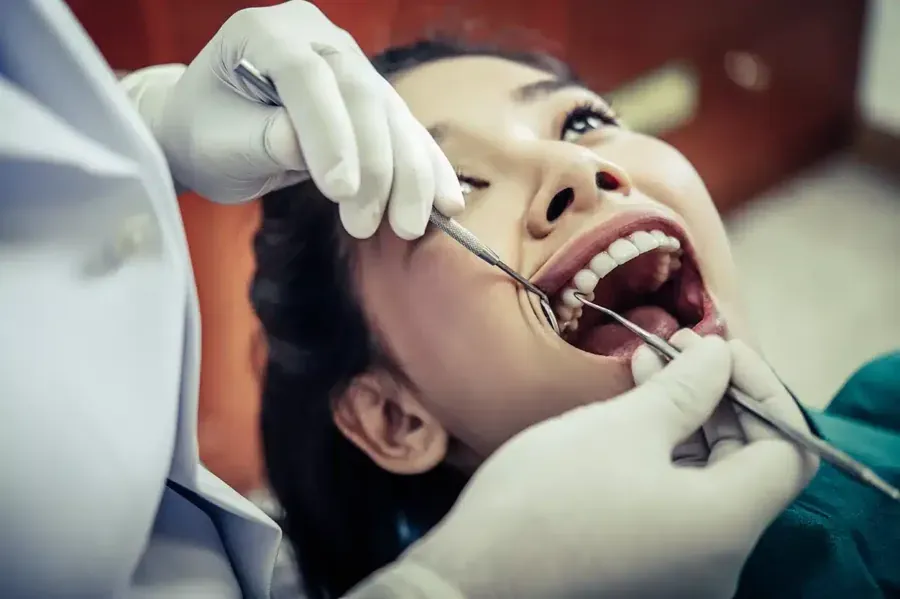 Patient receiving dental treatment